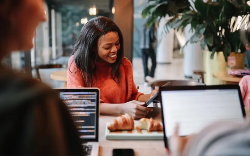 woman working with colleagues