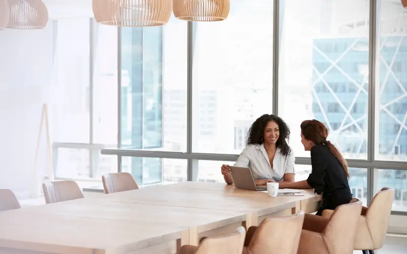 colleagues working together in a bright modern conference room