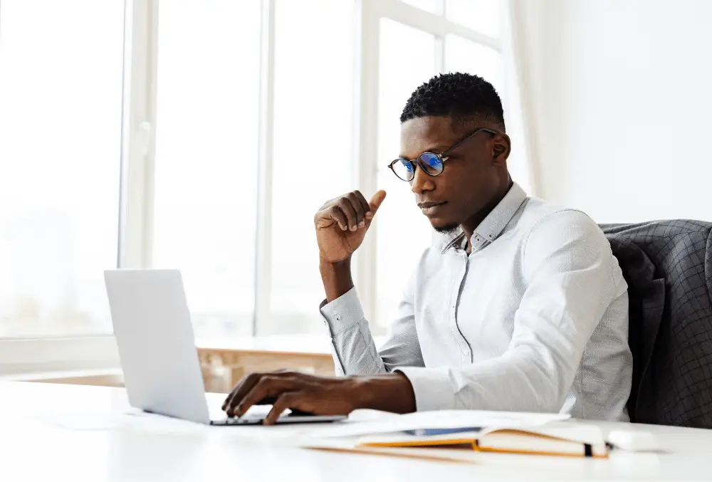 person working independently at laptop