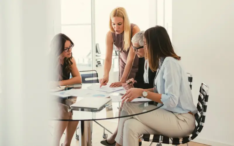 individuals collaborating at work in a modern office setting